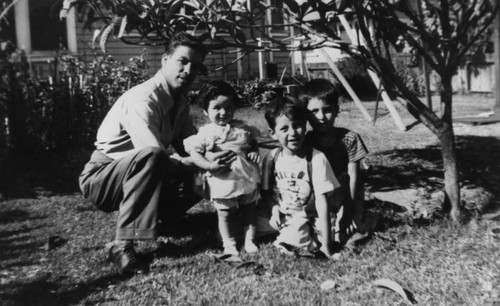 Mexican American father and children