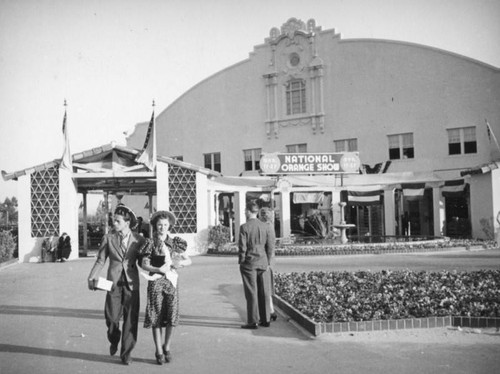 Couple leaving the National Orange Show Exhibition Hall, San Bernardino