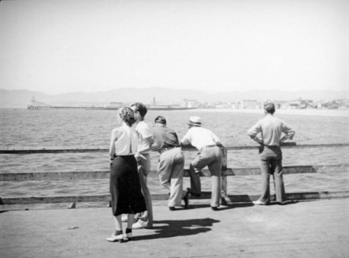 Hanging about at the Venice pier rail