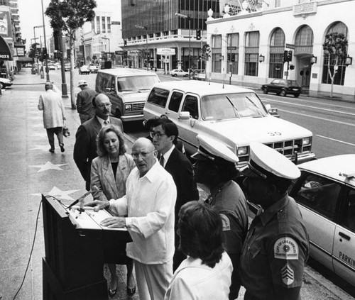 Merchant speaks on Hollywood Boulevard