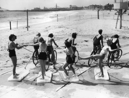 "52 Club" members riding on blocks of ice, view 8