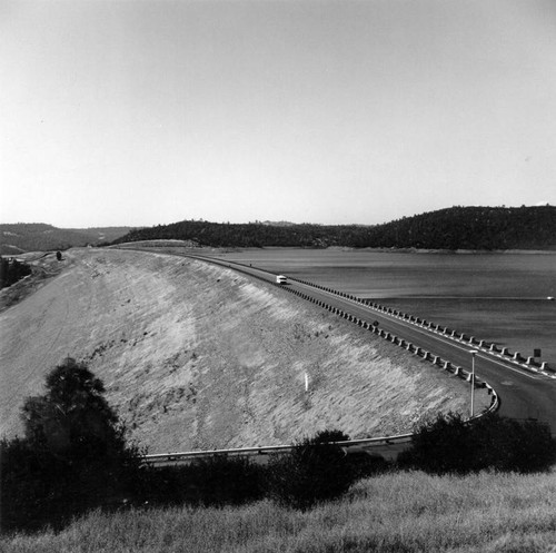 Reservoir dam with road