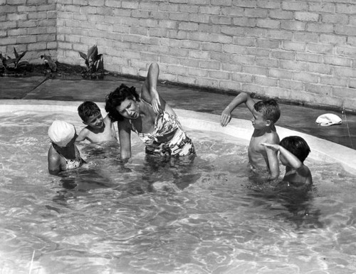 Backyard pool turned into swim school