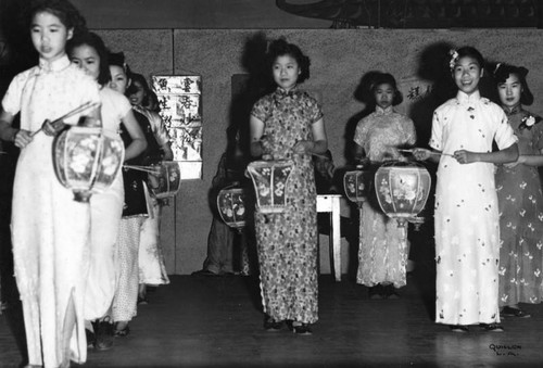 Girls holding Chinese lanterns