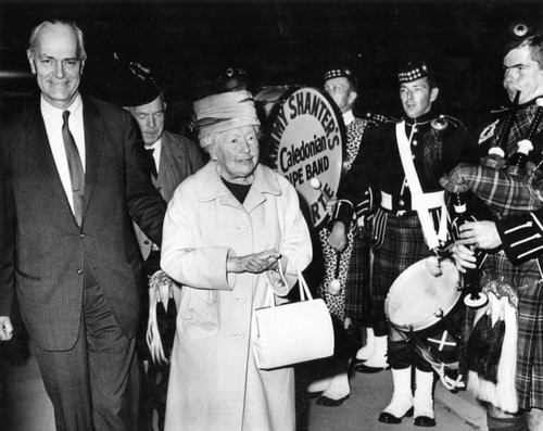 Dame Flora MacLeod, center, Tenneson Twitchell arrive in Los Angeles