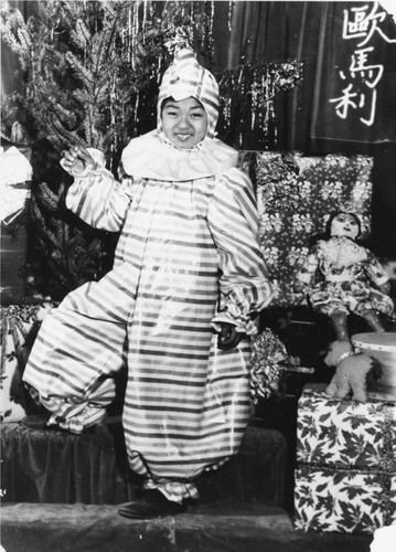 Chinese American girl in clown costume