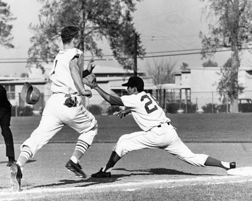 Pierce's Jimmy Yuill in a futile hurry to reach first base