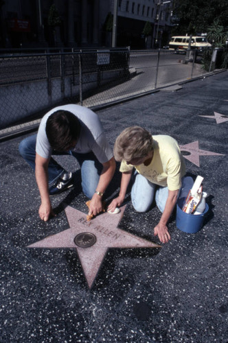 Cleaning a Walk of Fame star