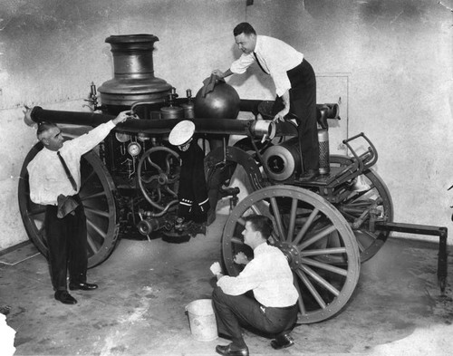 Cleaning an 1882 steam pumper