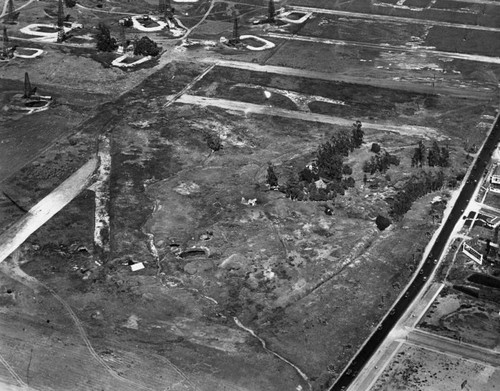 Aerial view of tar pits & oil derricks