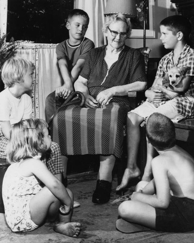 Clara W. Cleghorn with neighborhood kids