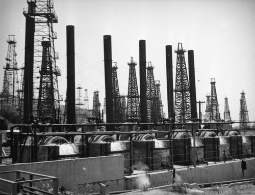 Water pours out of heater treaters in the Signal Hill oil field