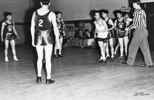 Boys playing basketball