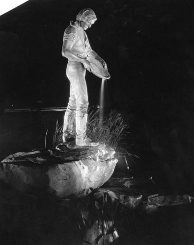 Pioneer Fountain Group statue, night view