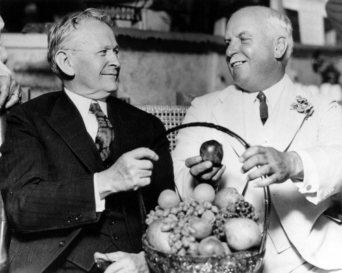 Young, passing the bountiful basket over to Rolph