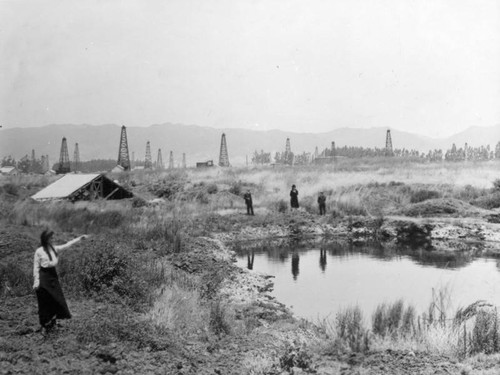 Tar pit and oil derricks