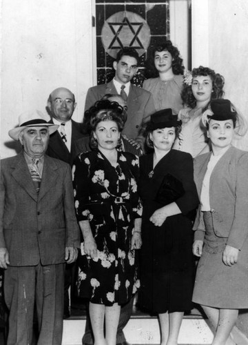 Wedding guests in synagogue