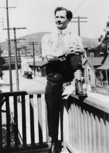 Mexican American sitting on porch