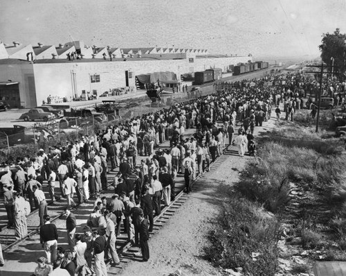 Soldiers march with fixed bayonets