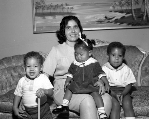 Unidentified woman and children