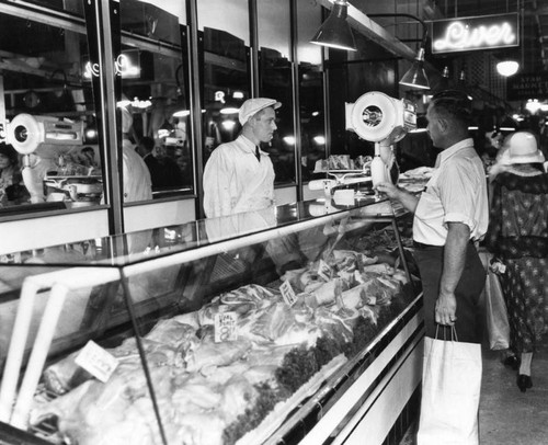 Shopping at the meat counter