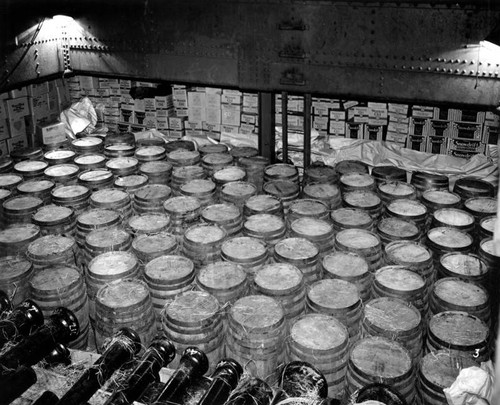 Barrels of liquor in the hold of a ship