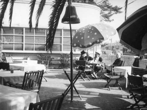 Schultheis family enjoying patio dining at Palms Grill in Hollywood