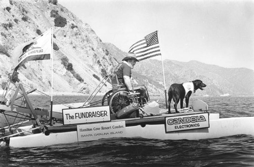 Wheelchair-powered paddle boat