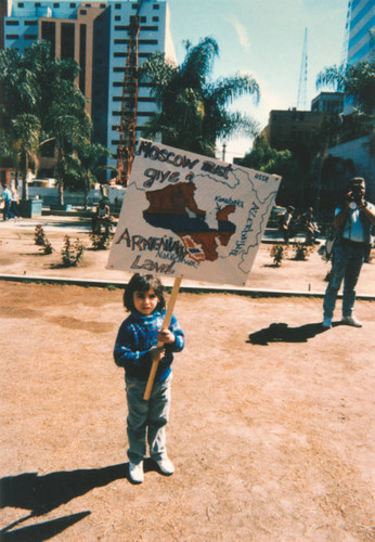 Armenian American child with protest sign