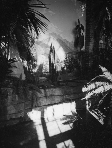 Mural, plants and a tepee at the State Exposition Building in Exposition Park