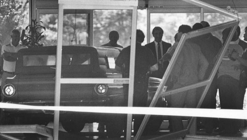 Car in lobby of Federal Building