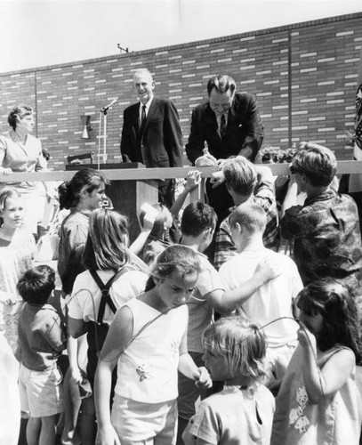 Officials mark library opening — Calisphere