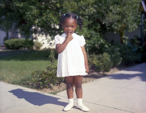 Child in white dress