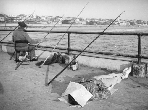 Fishing while asleep on the Manhattan Beach Pier