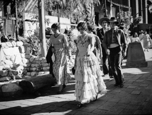 Women and men on Olvera Street