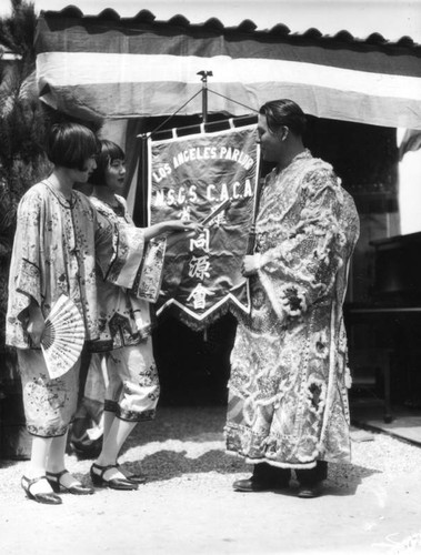 Chinese dressed in elaborate Chinese costume