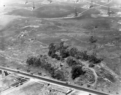 Aerial view of tar pits & oil derricks