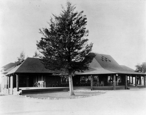 Building with porch, L.A. Country Club