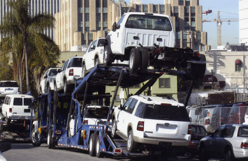 Car haulers on Sunset Place