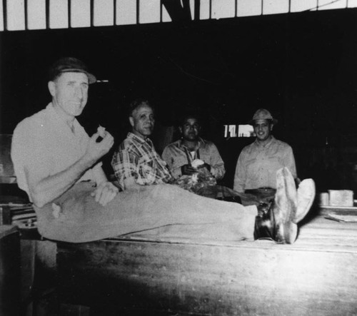 Workers in molding shop