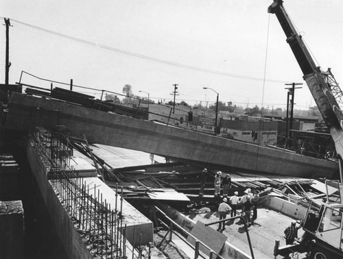 400-ton rail bridge collapses trapping two men inside truck