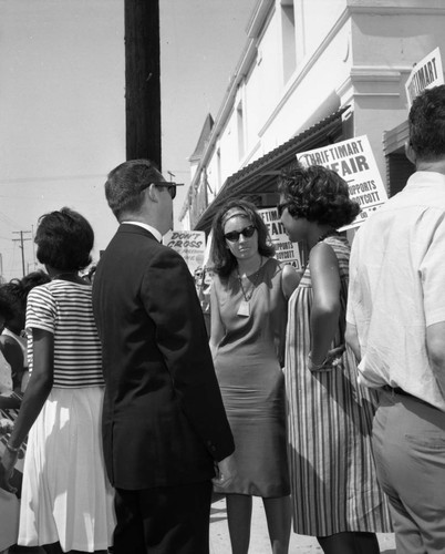 Demonstrators outside the Thriftimart