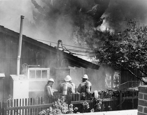 Flames destroy house