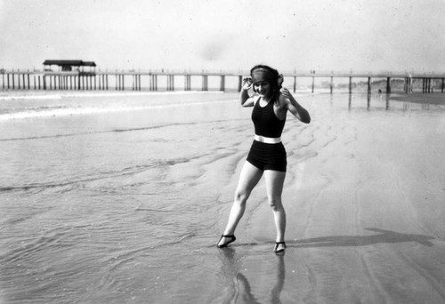 Women playing on beach, Long Beach