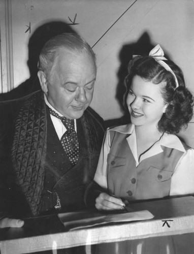 Actress Shirley Temple and comedian Charles Winninger