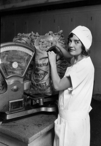 Weighing walnuts