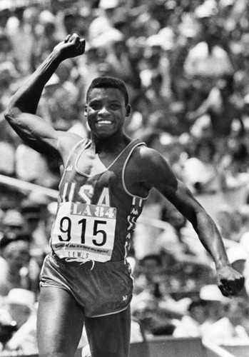 Carl Lewis beams