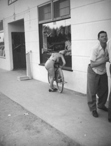 Cyclist by the Palms Springs Drug and Import Company