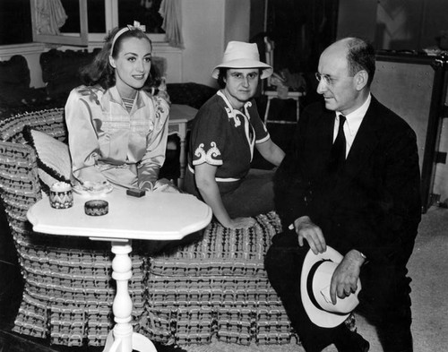 Couple on set with Joan Crawford