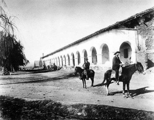 High traffic in front of San Fernando Rey de Espan~a Mission